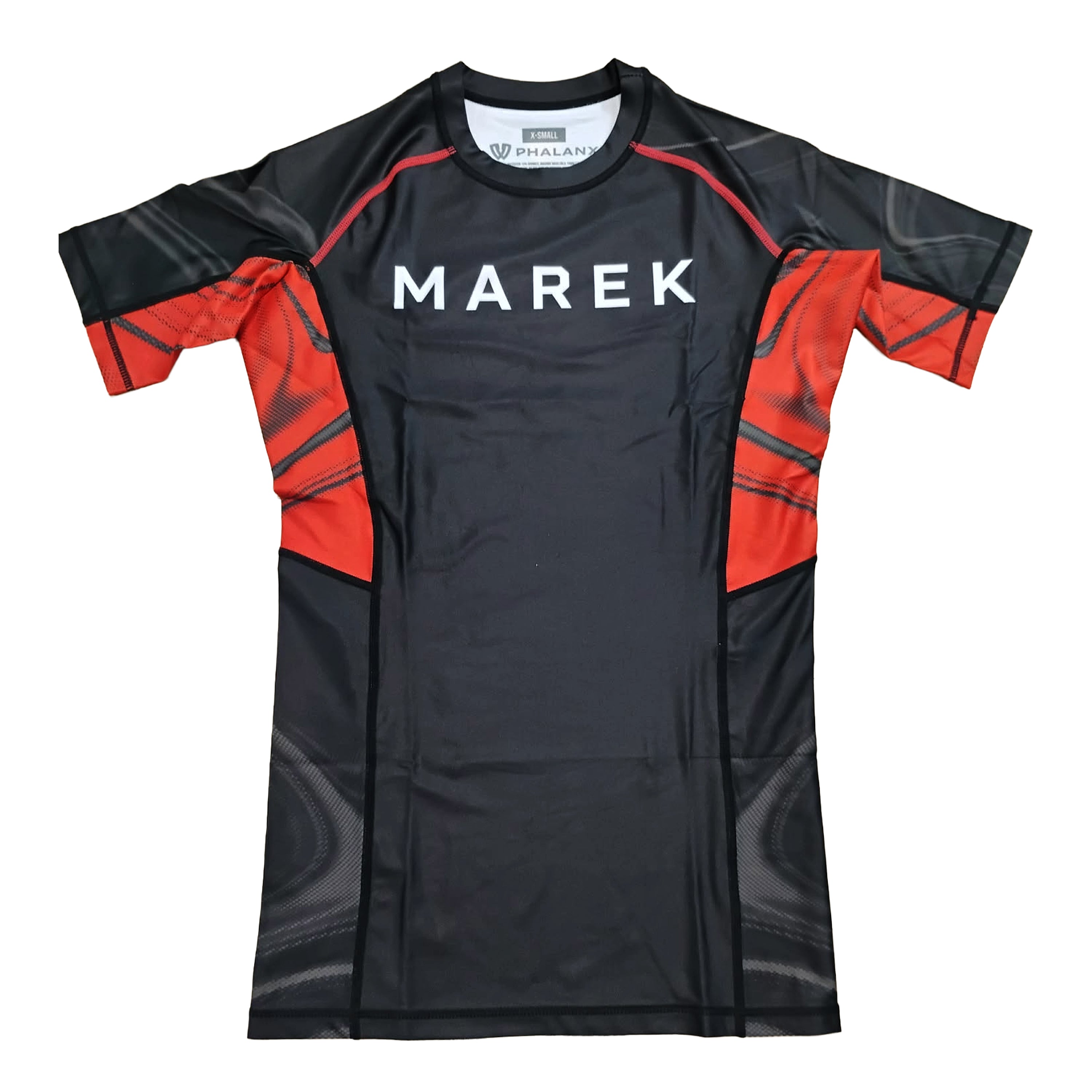 A short-sleeve athletic rash guard in black and red, featuring the brand name 'MAREK' printed in white across the chest, displayed flat against a white background.