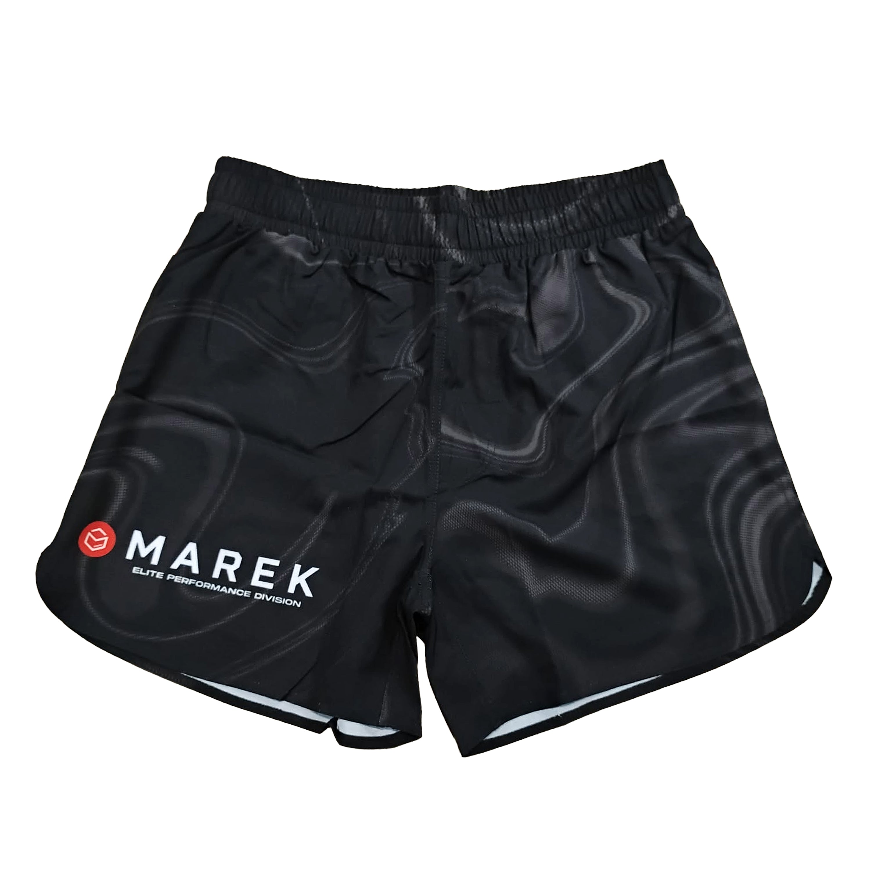 Black athletic shorts with a dark gray wavy pattern, featuring a white 'MAREK' logo and a small red smiley face on the left leg, displayed against a solid white background.